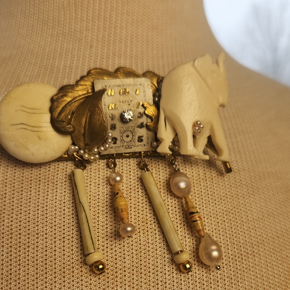 Elegant Gold and Cream Brooch